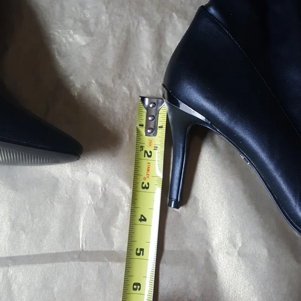 05:08   NINA Knee Boots
